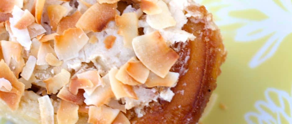 Delicious coconut flavored bread rolled with a brown sugar coconut filling and topped with a coconut frosting