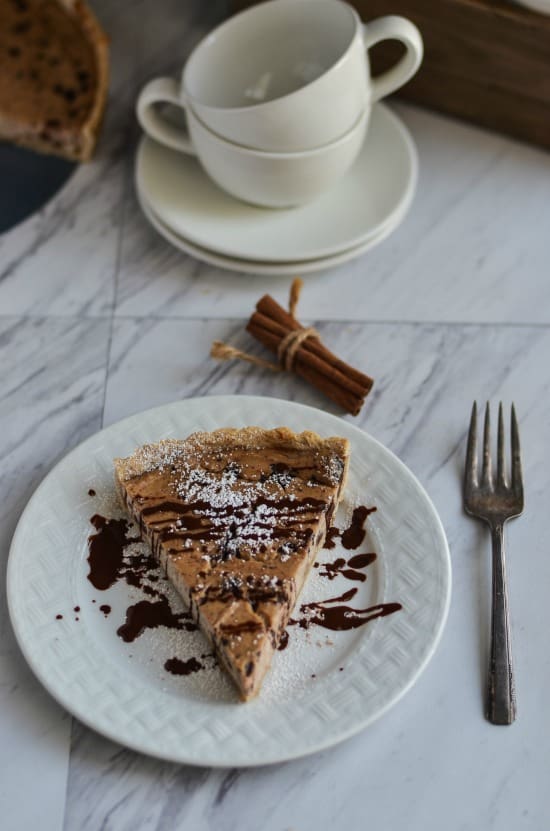 A buttery cinnamon crust with a creamy ricotta filling studded with chocolate chips making this Cannoli Tart the perfect holiday/ Thanksgiving pie! 