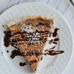 A buttery cinnamon crust with a creamy ricotta filling studded with chocolate chips making this Cannoli Tart the perfect holiday/ Thanksgiving pie!