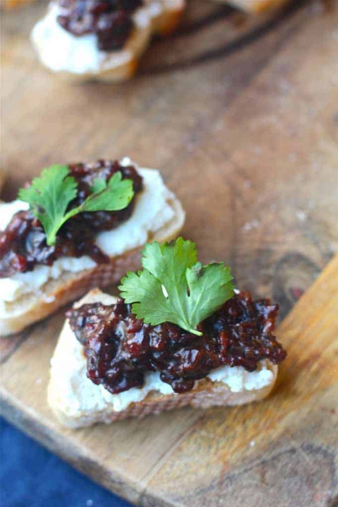 Bacon Jam Crostinis Garnished with Parsley