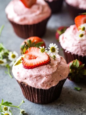 strawberry cupcakes with strawberry on top