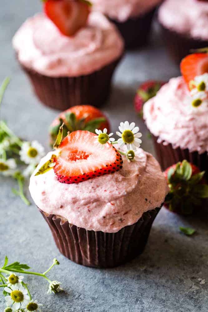 strawberry cupcakes with strawberry on top
