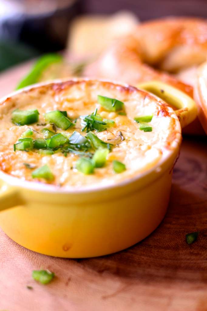 up close photo of the beer cheese in small yellow dish. 