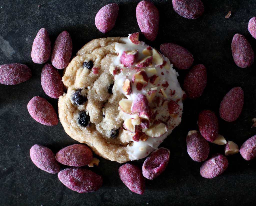 Blueberry Almond Cookies dipped in white chocolate and sprinkled with blueberry flavored almonds
