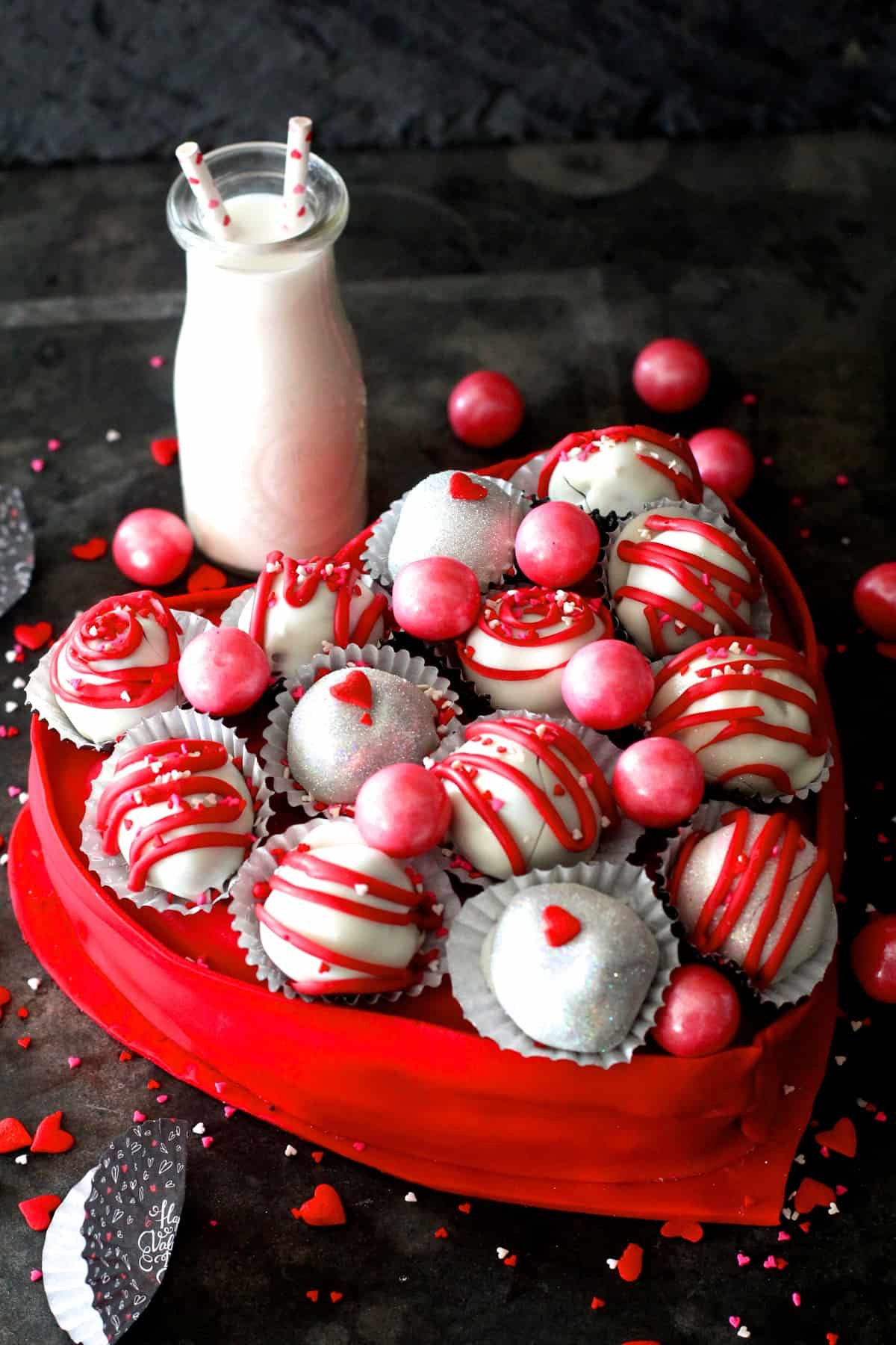 What is Valentine's day without a heart shaped box full of chocolates? Well this year, instead of buying one, make a completely edible heart box and fill it with fun cake balls. 