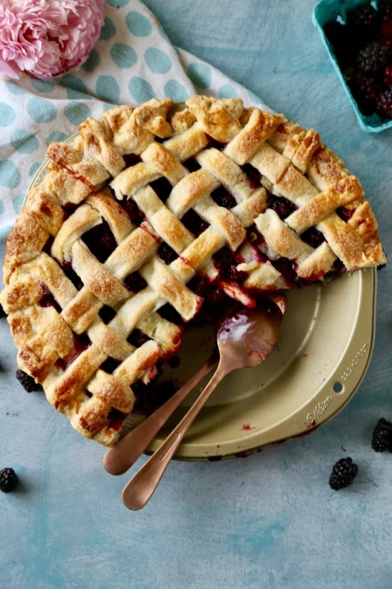Fresh vine ripe boysenberries in a flaky all butter lattice crust. This boysenberry pie is easy to make and delicious!