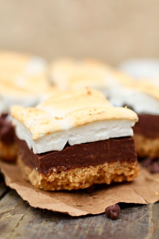 Perfect No-Bake S'mores Bars are made with a buttery graham cracker crust, rich chocolate fudge center and golden brown toasted marshmallow topping