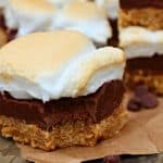 Perfect No-Bake S'mores Bars are made with a buttery graham cracker crust, rich chocolate fudge center and golden brown toasted marshmallow topping