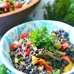 A delicious salad made of lentils, quinoa, and rice combined with fresh crunchy veggies and a delicious mustard dressing.