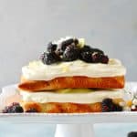Vanilla lemon infused cake studded with fresh juicy blackberries and layered with fresh lemon curd and cream cheese frosting!