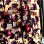Decadent dark chocolate brownies, swirled with silky cream cheese cheesecake filling, and studded with sweet summer cherries.