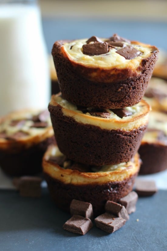 A rich chocolatey brownie bottom topped with a silky cheesecake topping and chocolate chunks. These black and white brownies will be your new favorite desert muffin. 