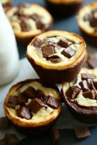 A rich chocolatey brownie bottom topped with a silky cheesecake topping and chocolate chunks. These black and white brownies will be your new favorite desert muffin.