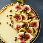 Stunning no bake mascarpone tart topped with fresh tiger figs, honey, and pistachios