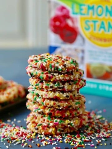 Chewy bakery style sugar cookies coated in colorful sprinkles