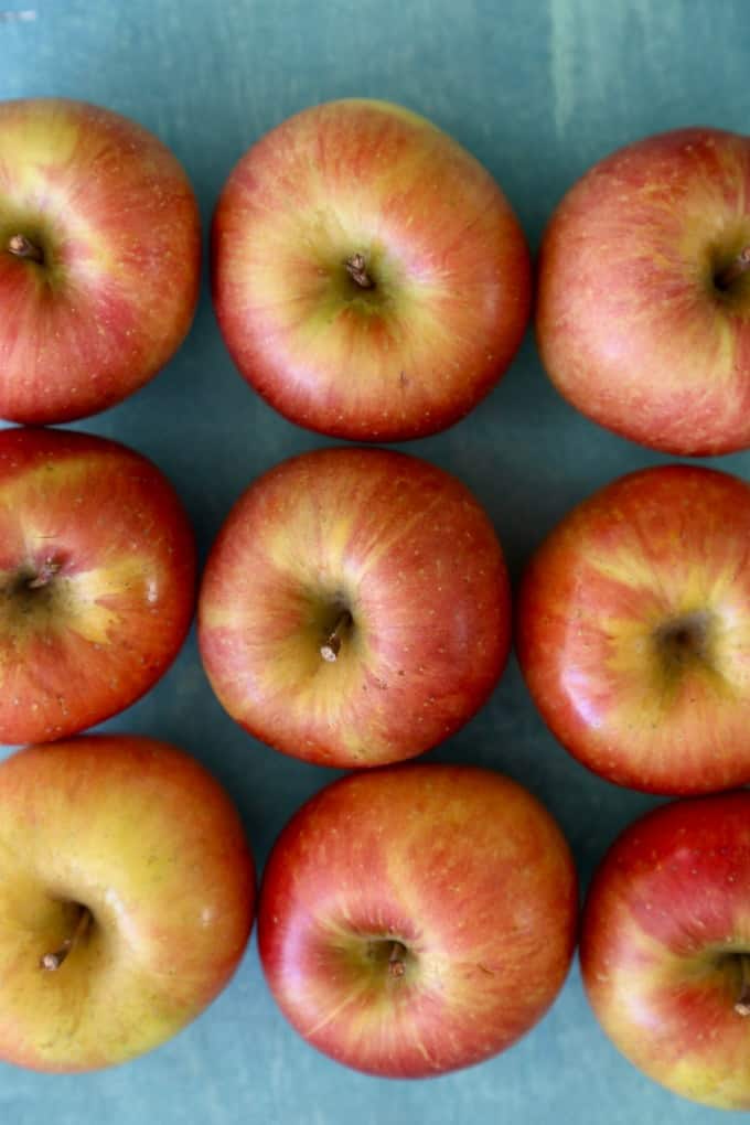 overhead view of nine evercrisp apples ready to be dipped in homemade nutella