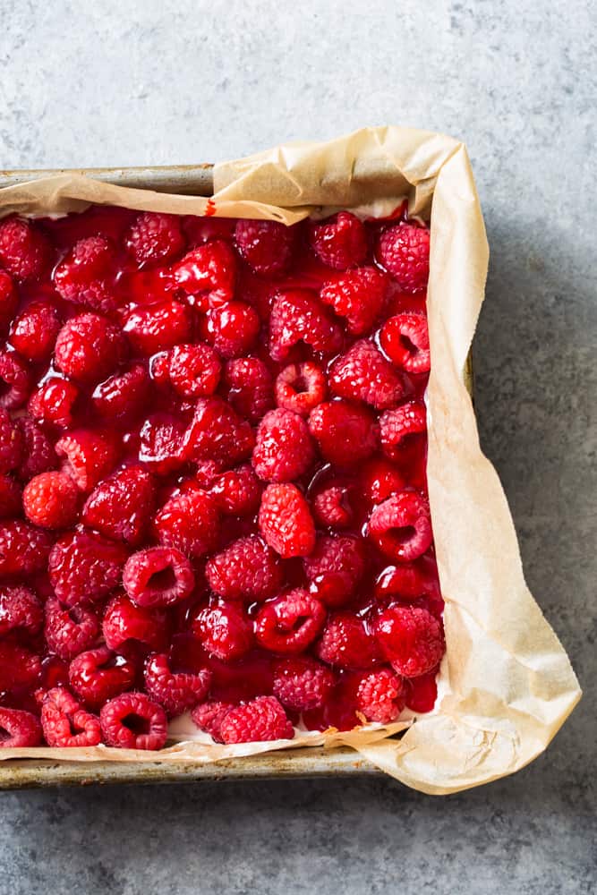 pan of raspberry cheesecake shortbread bars