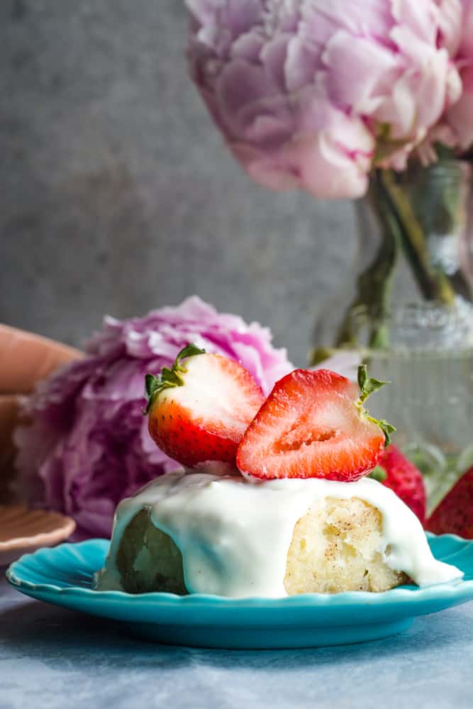 Biscuit Cinnamon Rolls with cream cheese frosting and strawberries