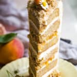 slice of peach layer cake