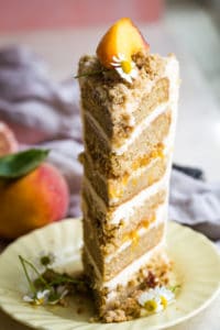 slice of peach layer cake