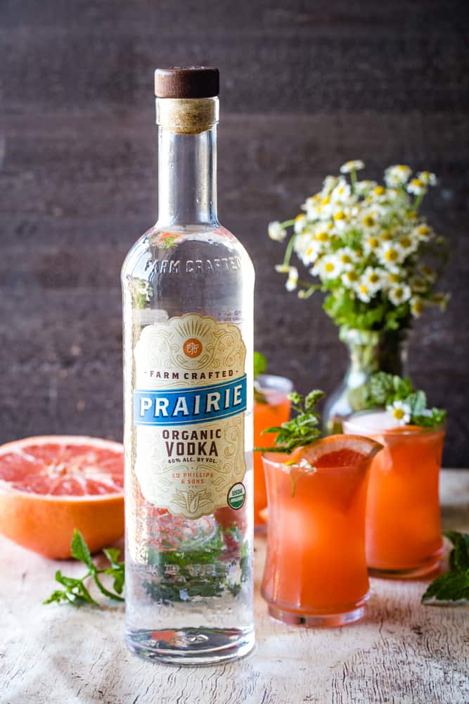 mint grapefruit vodka cocktail with vodka bottle