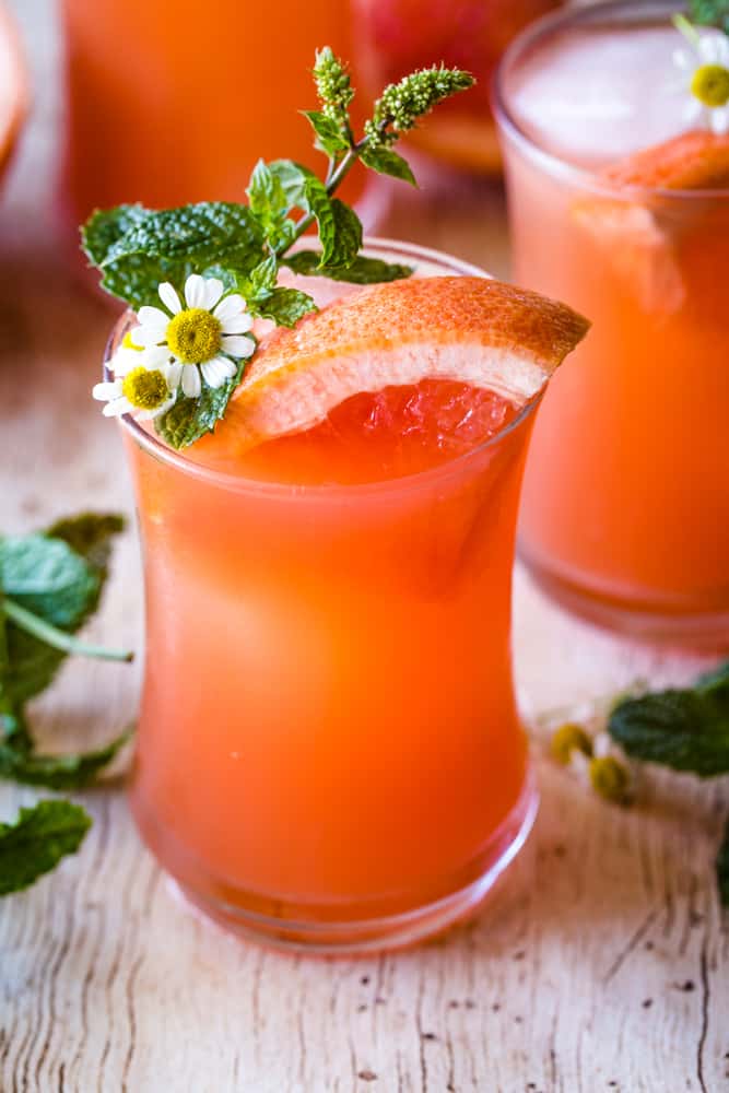 mint grapefruit vodka cocktail in a glass and garnished