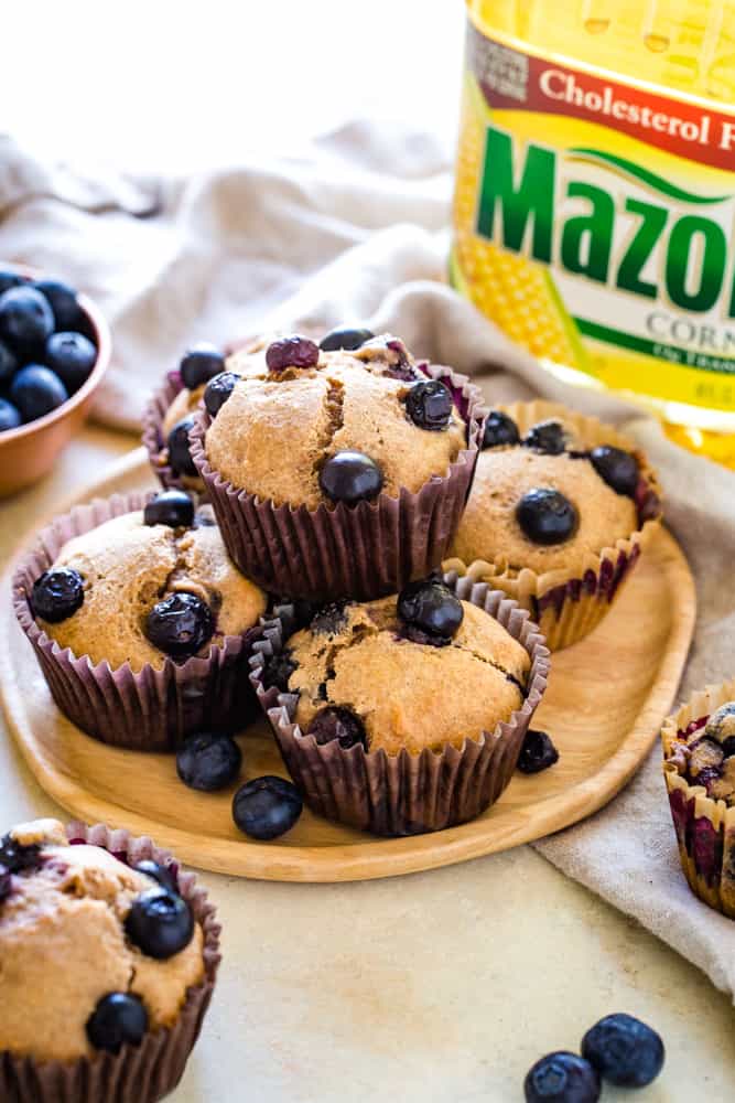 plate stacked with low-fat blueberry muffins