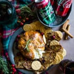 cranberry baked brie on plate with soda