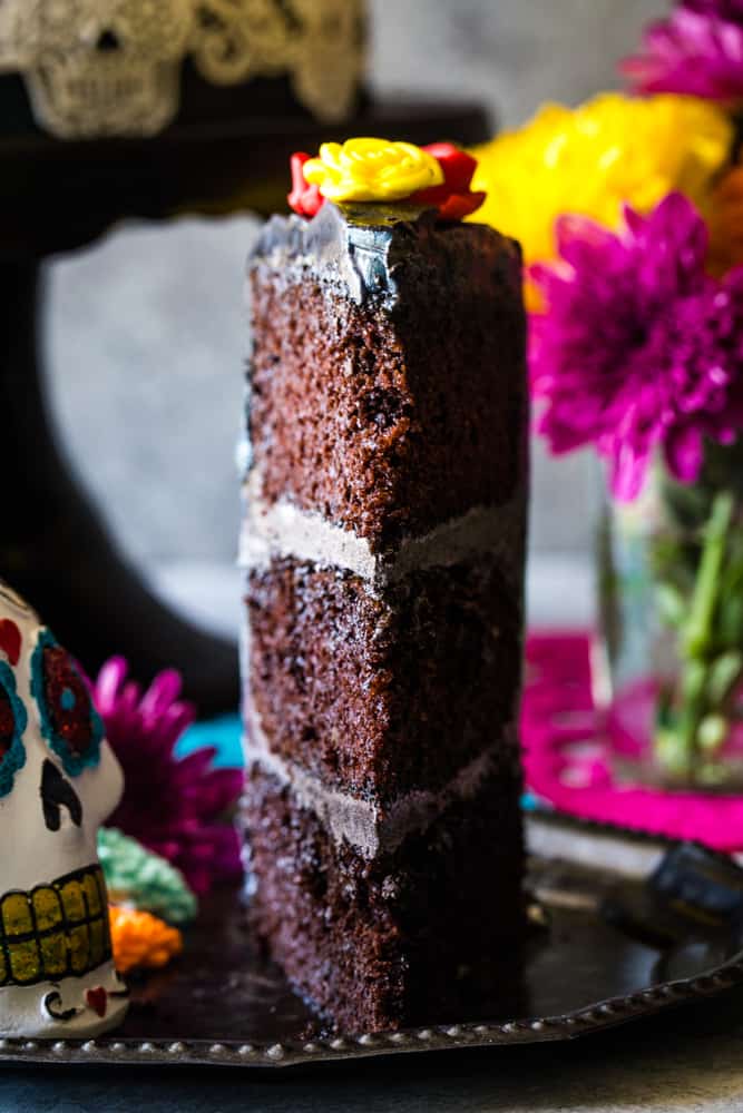 three layer slice of day of the dead layer cake