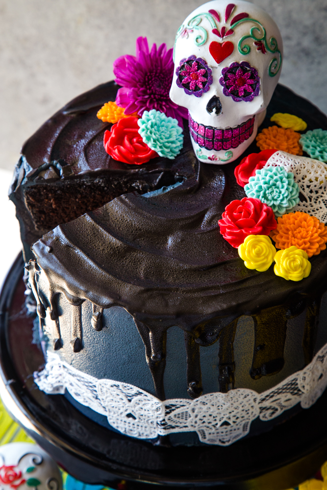 day of the dead cake with slice removed