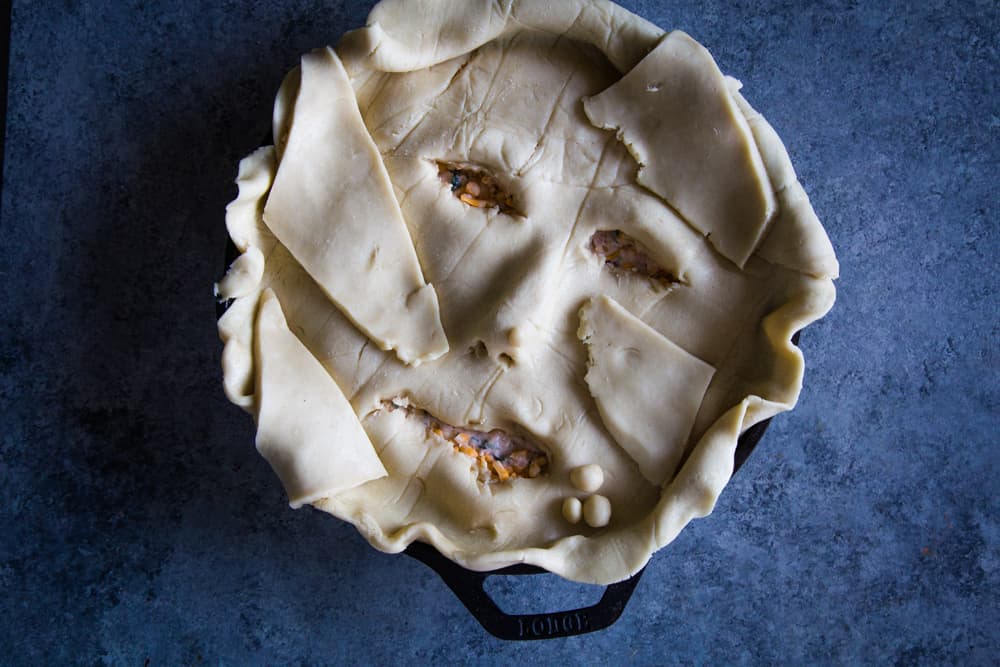 halloween face pie dip in skillet before baking