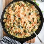 brussels sprouts au gratin in a cast iron pan
