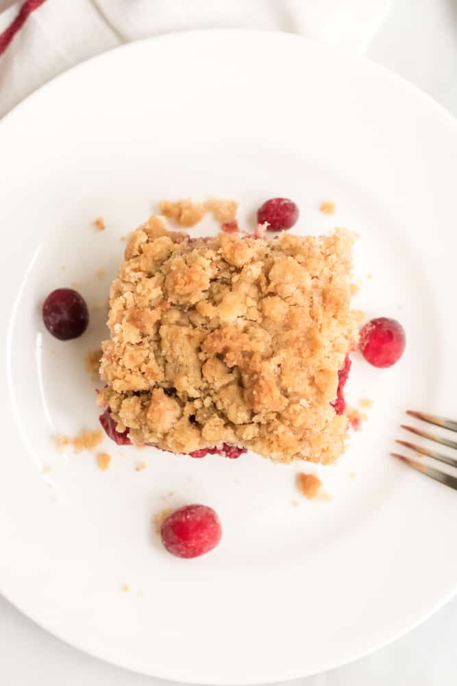 Overhead shot of the coffee cake streusel on a white plate.