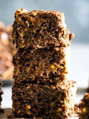 suare image of the stacked cocoa pebbles peanut butter treats.
