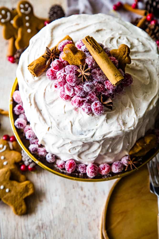 sugared cranberries on top og gingerbread layer cake