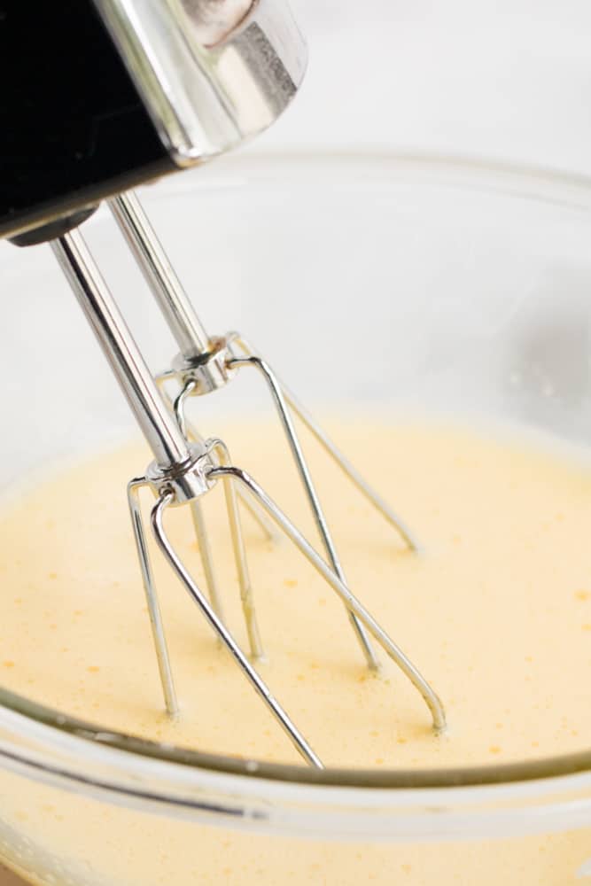 mixing ingredients for classic eggnog recipes