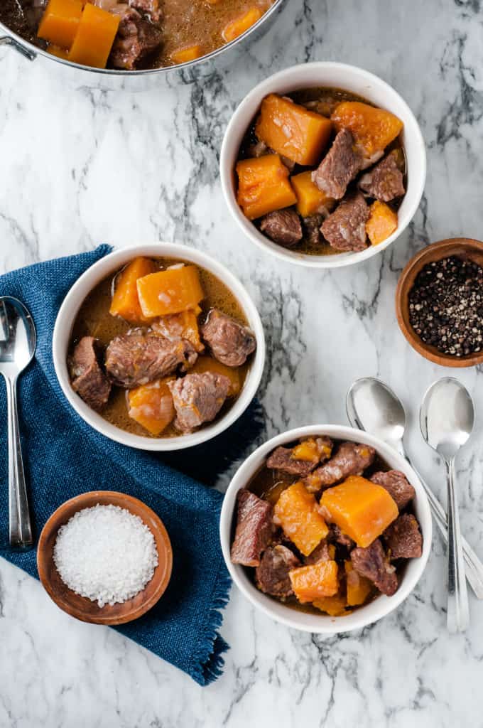 butternut squash beef stew with bowl of salt 