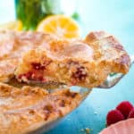 slice of lemon raspberry pie on pie slicer