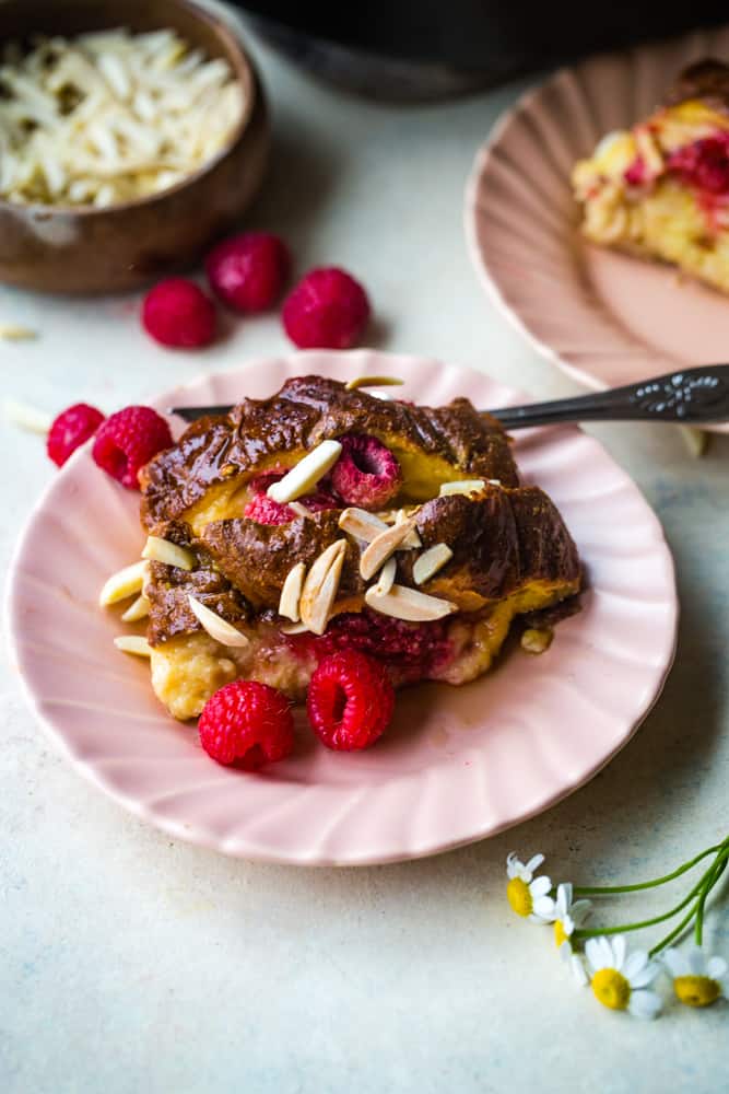 pink plate with raspberry almond french toast scoop