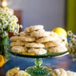 green cake stand with lemon bars cookies