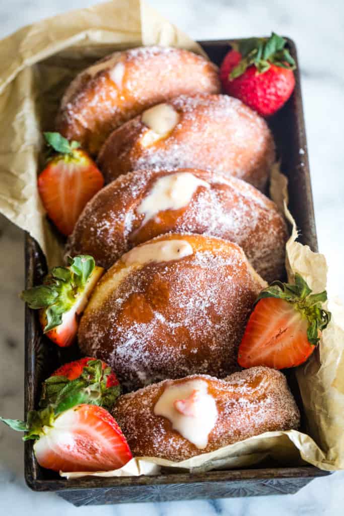 loaf pan with strawberry custard donuts