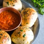 mozzarella pizza dough bites on metal plate