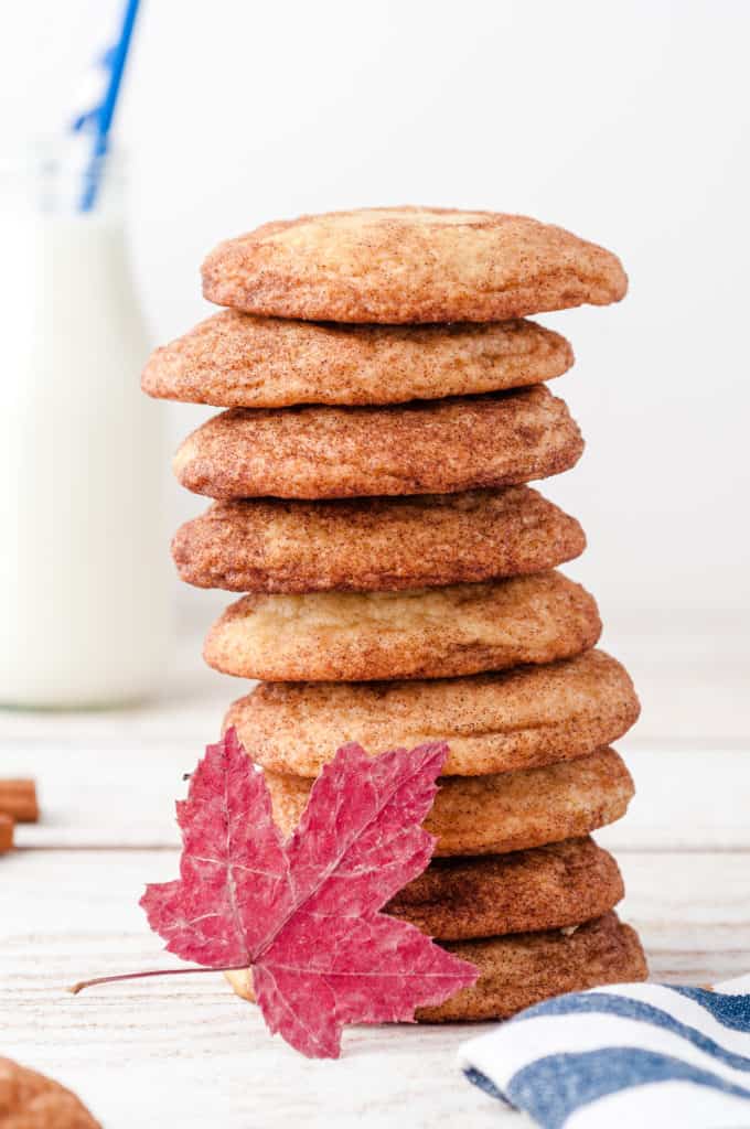 stack of maple snickerdoodle cookies with red maple leaf