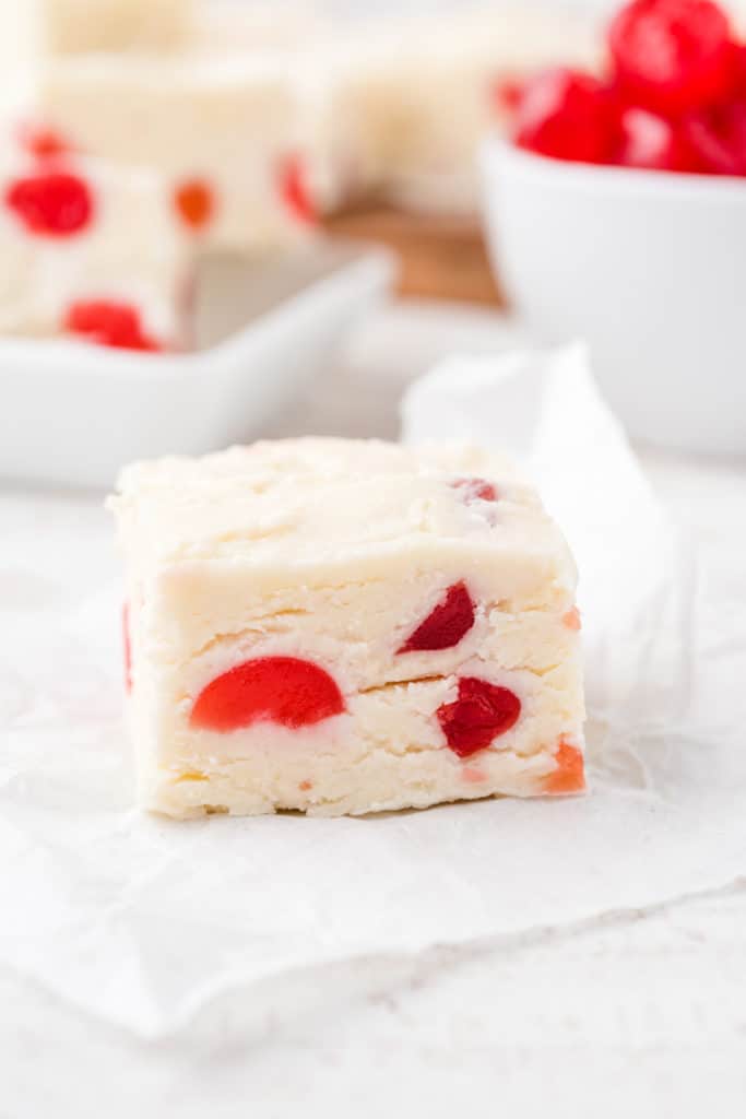 up close shot of a cherry cheesecake fudge square