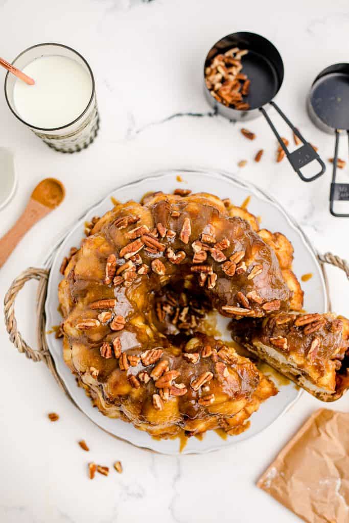 taking a slice out of the monkey bread overhead shot