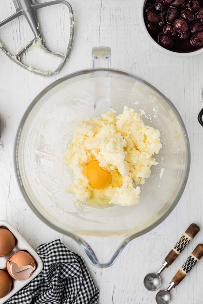 creaming butter and eggs in glass bowl