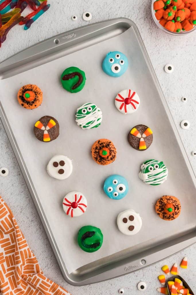 cookie sheet with halloween dipped Oreos