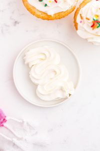 small white plate with Swiss meringue buttercream
