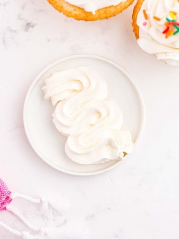 small white plate with Swiss meringue buttercream