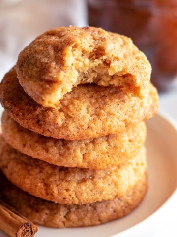 Feature image of the apple butter snickerdoodles on a small white plate.